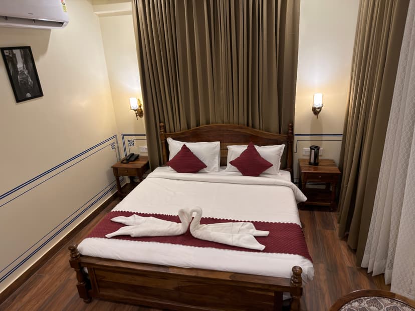 Royal Deluxe Room with king bed and Rajasthani decor